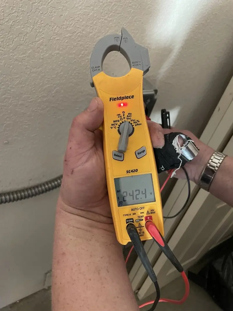 Voltage testing with clamp meter during Circuit Breaker Repair in Mount Carmel